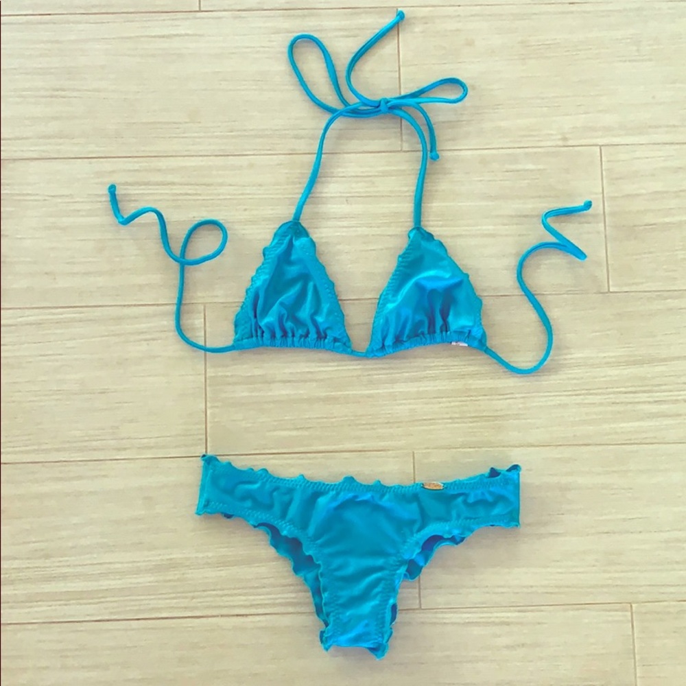 Slightly iridescent blue scrunch bikini.